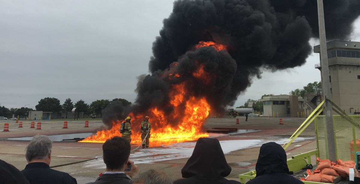 Conference participants watch testing of PFAS-free firefighting foams