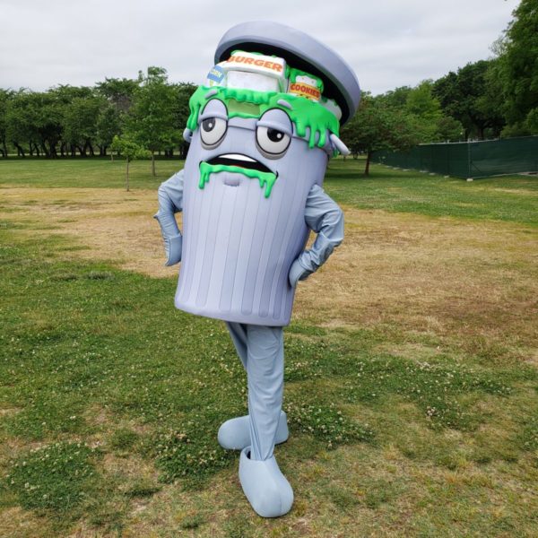 Polluted-Polly-posing-grassy-field